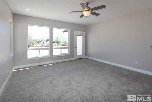 carpeted empty room featuring recessed lighting, baseboards, and ceiling fan