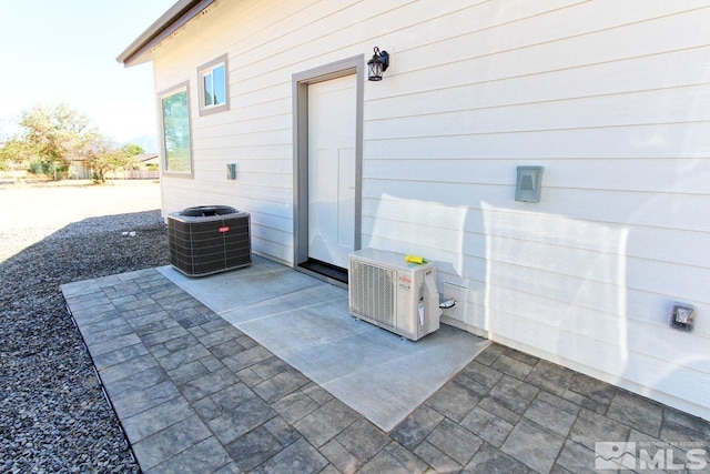 view of patio with central AC unit