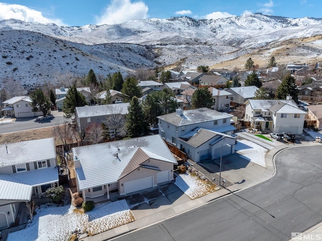 bird's eye view featuring a residential view and a mountain view