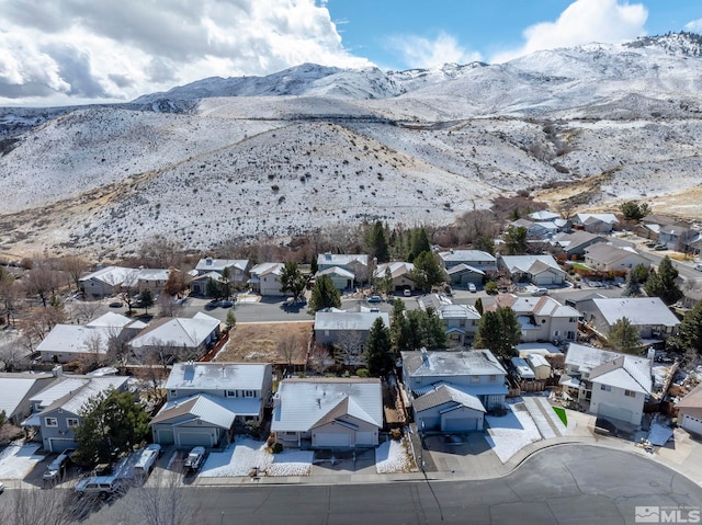 aerial view featuring a mountain view and a residential view