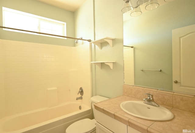 full bath with vanity, shower / bathing tub combination, and toilet