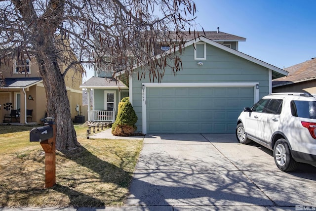 view of front of property featuring an attached garage and driveway