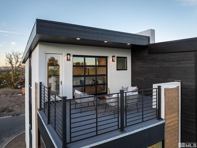 exterior space featuring stucco siding