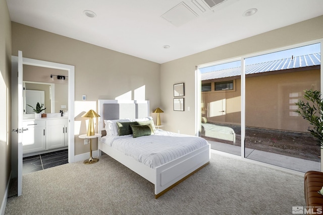 bedroom featuring baseboards and carpet floors