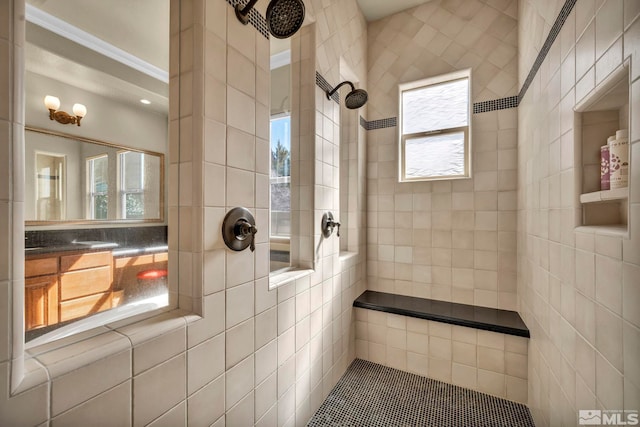 bathroom featuring a tile shower