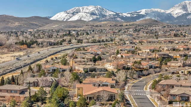 aerial view with a residential view and a mountain view