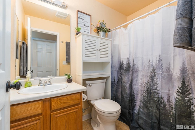 bathroom featuring curtained shower, toilet, and vanity