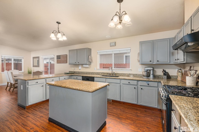 kitchen with gray cabinetry, a chandelier, a peninsula, black appliances, and a sink