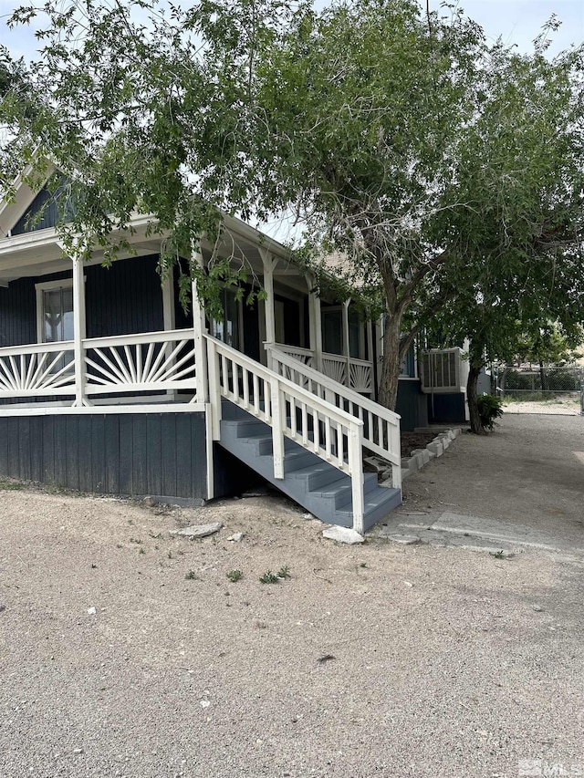view of home's exterior featuring a porch