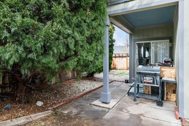 view of patio / terrace with fence