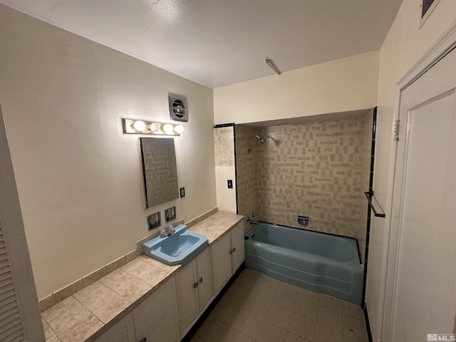full bathroom with vanity and  shower combination