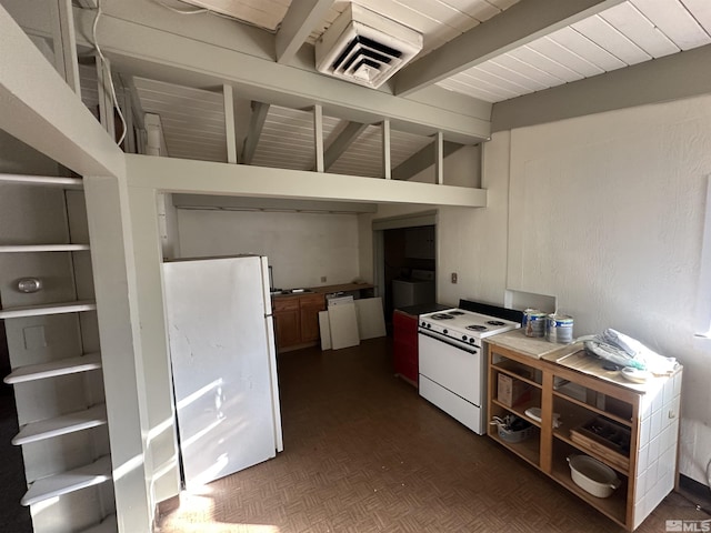 kitchen with white appliances and beamed ceiling