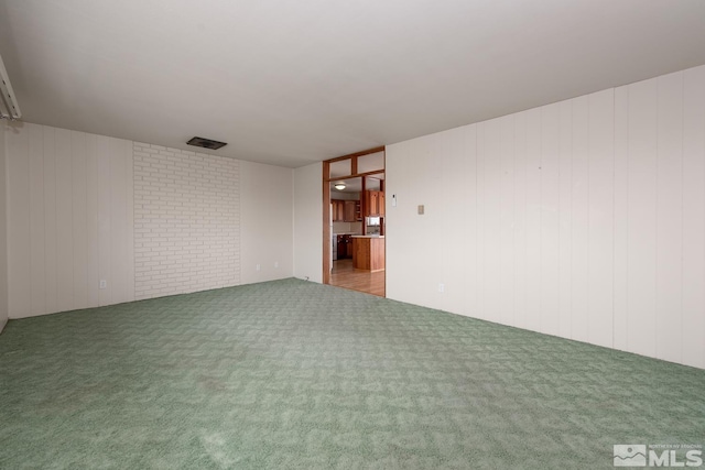 unfurnished room featuring carpet flooring