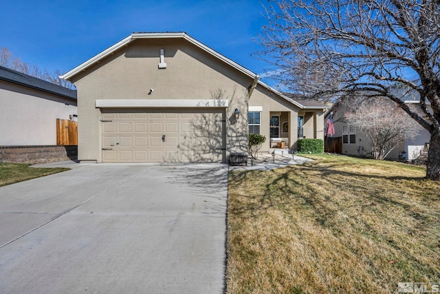 single story home featuring a front lawn, driveway, stucco siding, and a garage