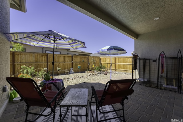 view of patio featuring a fenced backyard