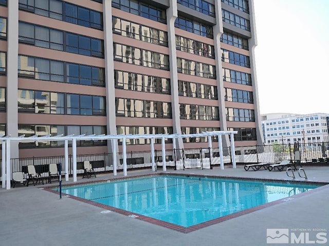 pool featuring fence