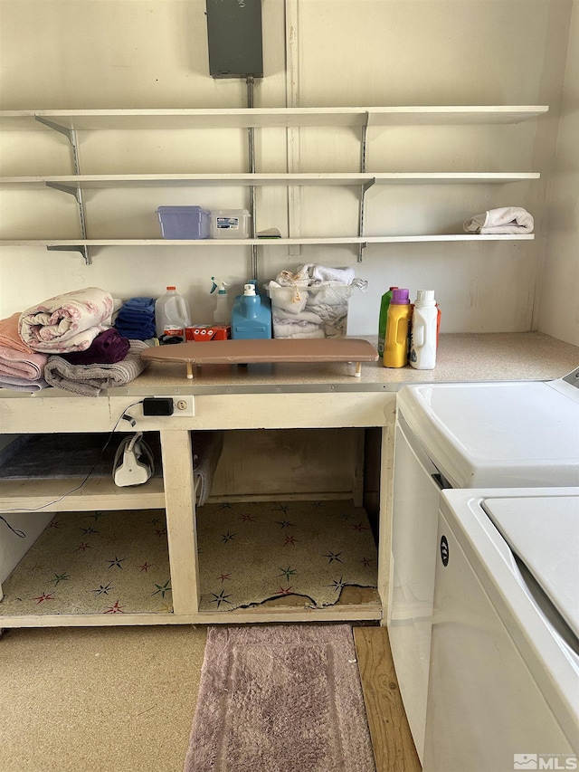 washroom featuring laundry area and washer and clothes dryer