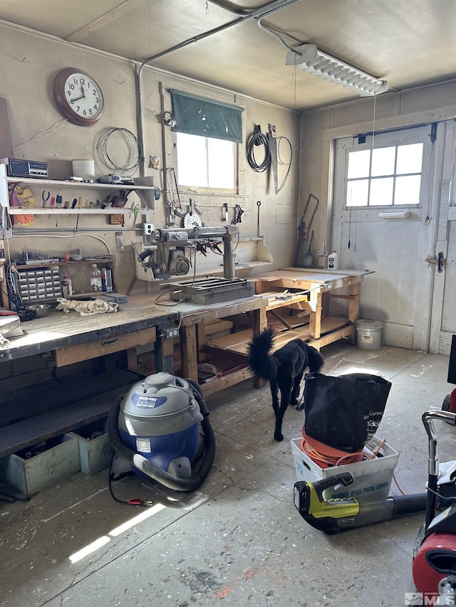 garage featuring a workshop area
