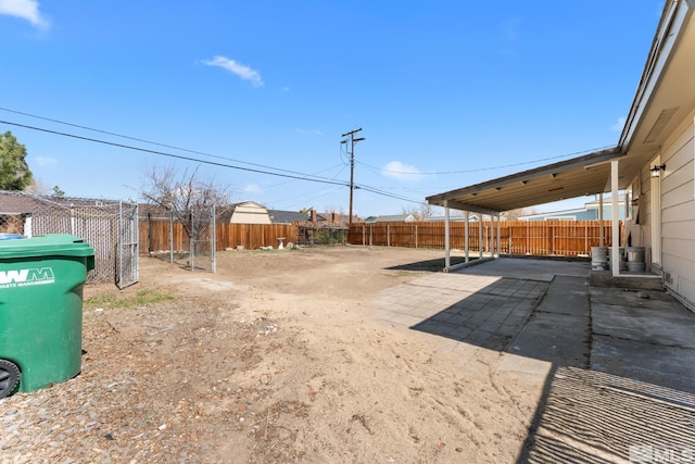 view of yard with a patio and a fenced backyard