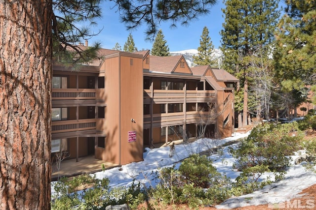 view of snow covered property