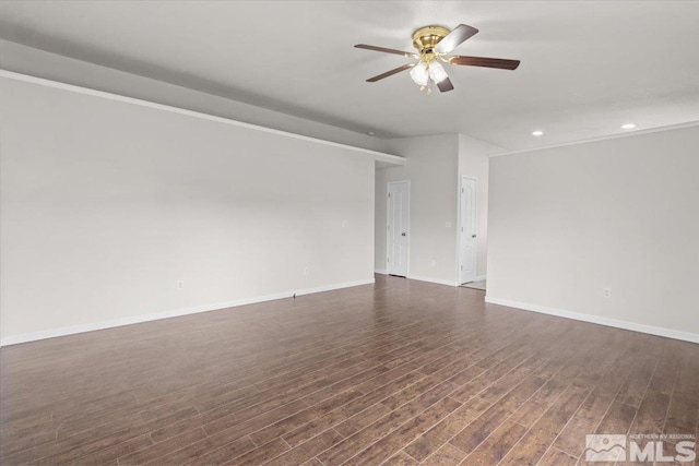 unfurnished room featuring dark wood-type flooring, baseboards, recessed lighting, and a ceiling fan