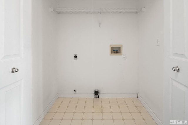 clothes washing area featuring washer hookup, baseboards, laundry area, light floors, and electric dryer hookup