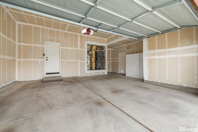 garage with heating unit and a garage door opener