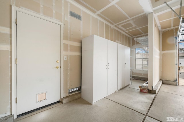 garage featuring visible vents