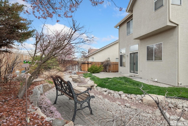 exterior space featuring a fenced backyard