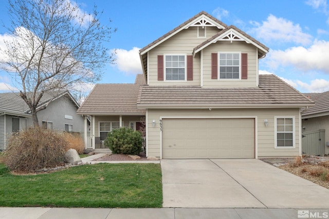 view of front of house with an attached garage, a tiled roof, concrete driveway, and a front yard