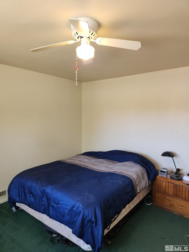bedroom with carpet flooring and a ceiling fan