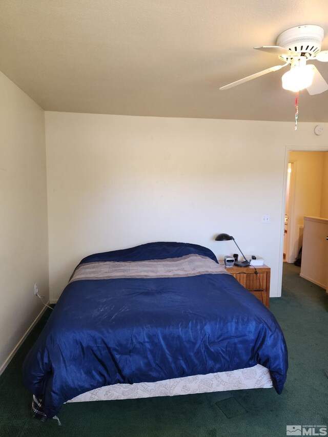 bedroom featuring a ceiling fan and carpet floors