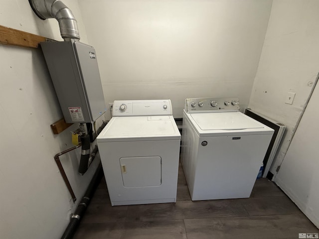 laundry area featuring separate washer and dryer and laundry area