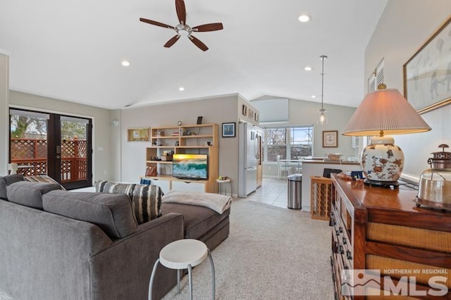 living area featuring light carpet, recessed lighting, vaulted ceiling, and ceiling fan