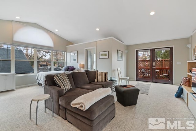 living area featuring vaulted ceiling, carpet, and recessed lighting