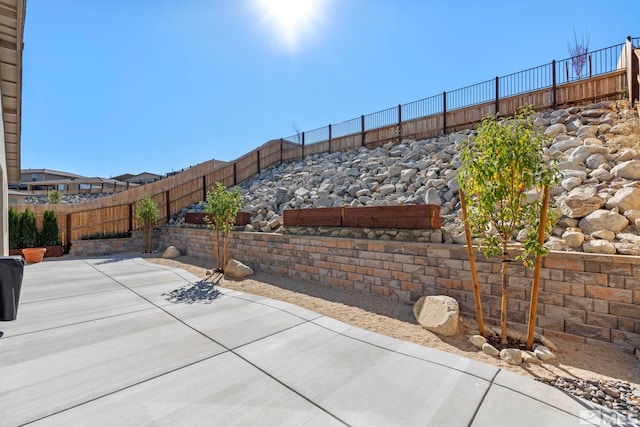 view of patio featuring a fenced backyard