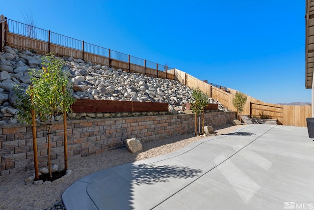 view of patio featuring a fenced backyard