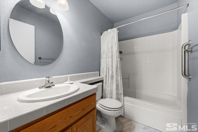full bathroom with toilet, vanity, a textured wall, and shower / bath combo with shower curtain