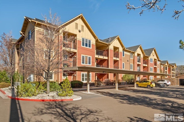 view of property with covered parking