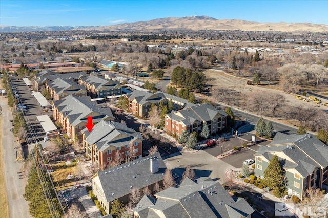 aerial view featuring a mountain view and a residential view