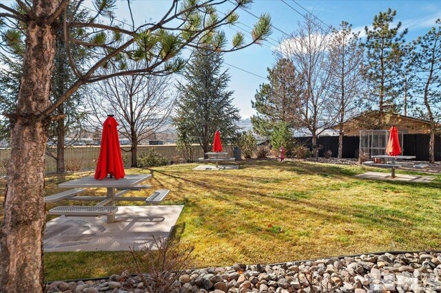 view of yard featuring a fenced backyard and a patio