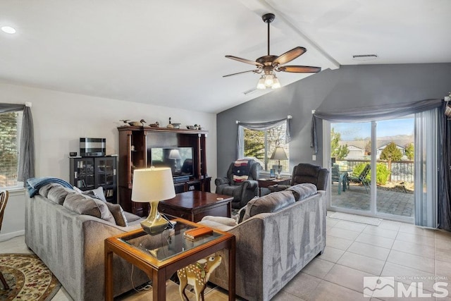 living room featuring visible vents, ceiling fan, vaulted ceiling with beams, and light tile patterned flooring