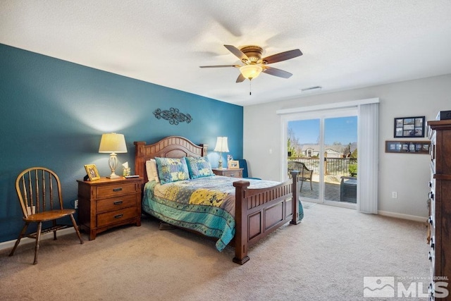 carpeted bedroom with visible vents, access to exterior, ceiling fan, and baseboards