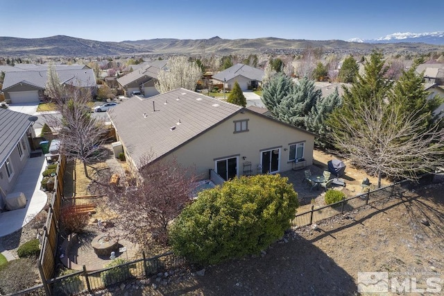 aerial view with a mountain view and a residential view