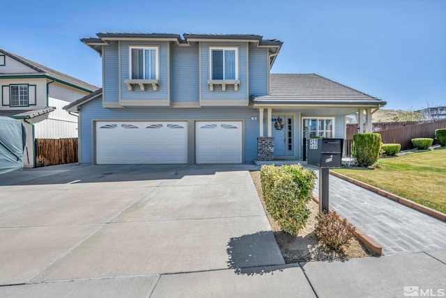 view of front of house featuring a garage, a front lawn, fence, and concrete driveway