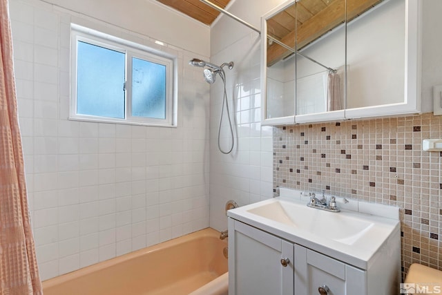 full bathroom with vanity, shower / bath combination with curtain, tile walls, and decorative backsplash
