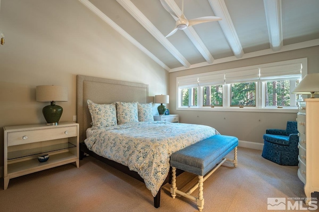 bedroom featuring carpet floors, baseboards, and vaulted ceiling with beams