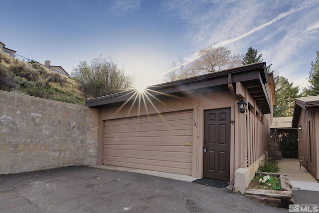 garage featuring fence