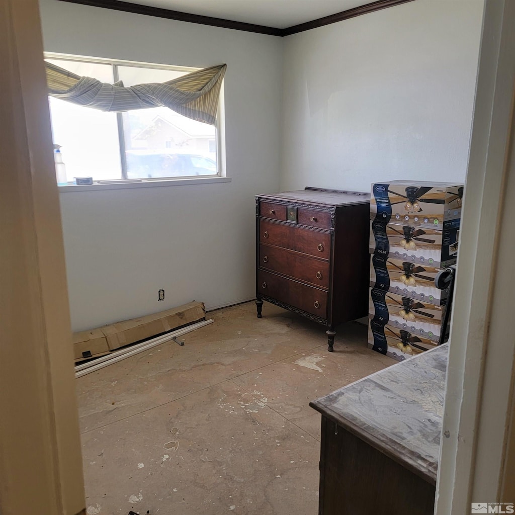 bedroom featuring crown molding