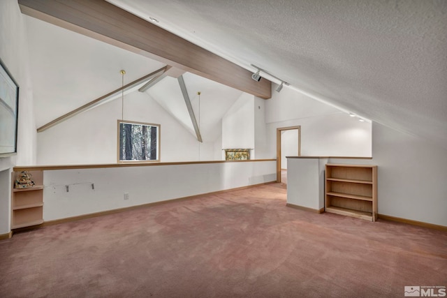 bonus room with carpet floors, baseboards, a textured ceiling, and lofted ceiling